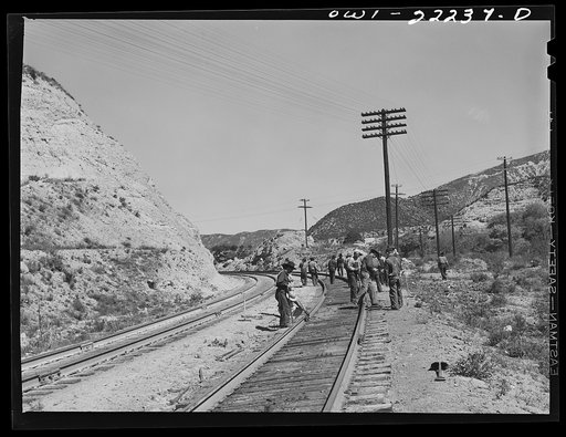 Untitled photo, possibly related to: Cajon, California. Indian section gang working on the Atchison, Topeka, and Santa Fe Railroad track