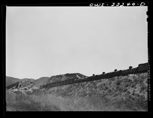 Cajon, California. Atchison, Topeka, and Santa Fe Railroad train going up the steep grade from San Bernardino to Summit