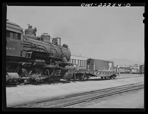 San Bernardino, California. Switching operations in the yard used by the Atchison, Topeka, and Santa Fe Railroad