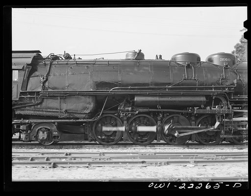 San Bernardino, California. A completely overhauled engine being run on the slip track at the Atchison, Topeka, and Santa Fe Railroad shops. This is done to break the engine in. Note that due to the greased track, the engine is standing still while the wheels are spinning
