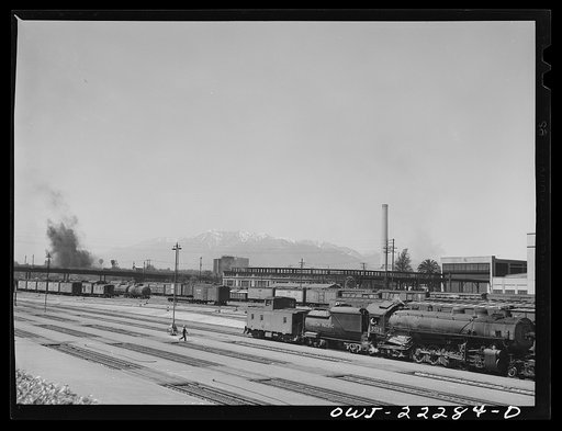 San Bernardino, California. Part of the yards of the Atchison, Topeka and Santa Fe Railroad