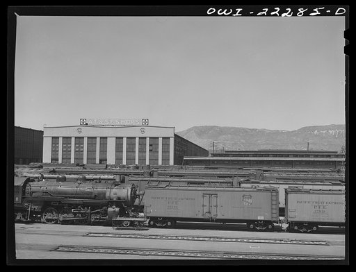 San Bernardino, California. Part of the yards of the Atchison, Topeka and Santa Fe Railroad