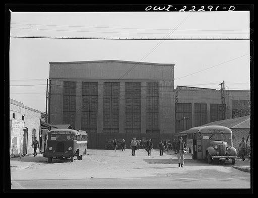 Untitled photo, possibly related to: San Bernardino, California. Men coming out of work at the end of a day's shift at the Atchison, Topeka and Santa Fe Railroad