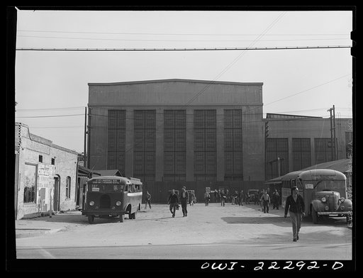 Untitled photo, possibly related to: San Bernardino, California. Men coming out of work at the end of a day's shift at the Atchison, Topeka and Santa Fe Railroad