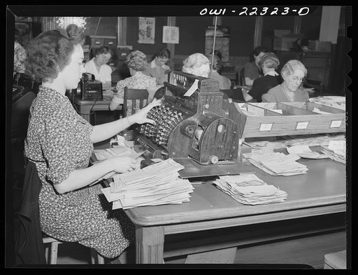 Philadelphia, Pennsylvania. The cashier totaling individual orders at the W. Atlee Burpee Company, seed dealers