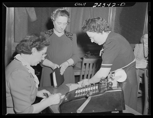 Philadelphia, Pennsylvania. Checking in the office at the W. Atlee Burpee Company, seed dealer
