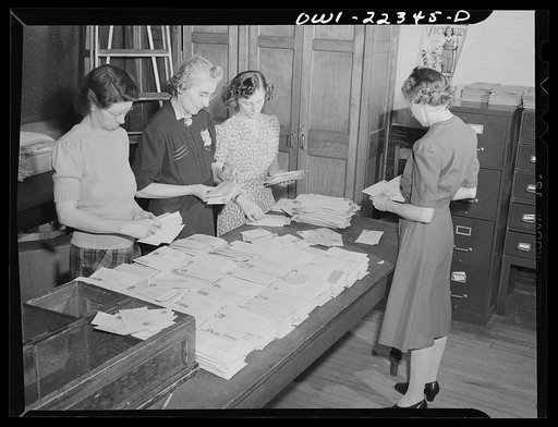Philadelphia, Pennsylvania. Sorting envelopes into regional piles at the W. Atlee Burpee Company, seed dealers