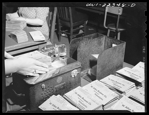 Untitled photo, possibly related to: Philadelphia, Pennsylvania. Letter slitter in operation at the W. Atlee Burpee Company, seed dealer