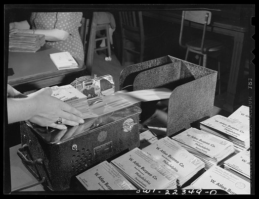 Philadelphia, Pennsylvania. Letter slitter in operation at the W. Atlee Burpee Company, seed dealer