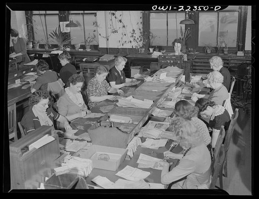 Untitled photo, possibly related to: Philadelphia, Pennsylvania. Opening the mail and counting the money at the W. Atlee Burpee Company, seed dealers
