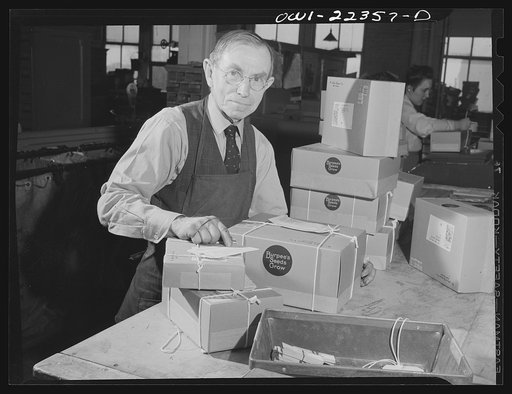 Philadelphia, Pennsylvania. Wrapper with packages of seed ready for the mail at the W. Atlee Burpee Company, seed dealers
