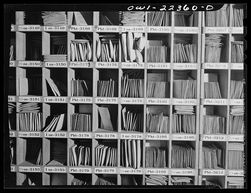 Philadelphia, Pennsylvania. Seed packages arranged in seed rack at the W. Atlee Burpee Company, seed dealers