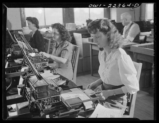 Philadelphia, Pennsylvania. Typing address labels at the W. Atlee Burpee Company, seed dealers. Typing on a flat bed typewriter