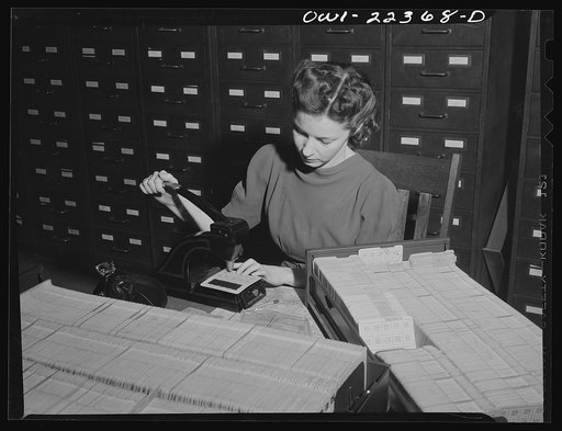 Philadelphia, Pennsylvania. Punching code information on mailing stencils