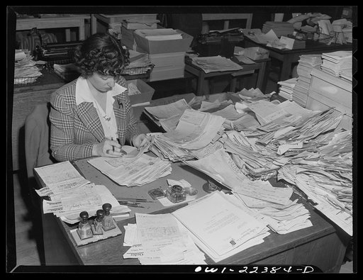 Philadelphia, Pennsylvania. Checking orders at the W. Atlee Burpee Company, seed dealers