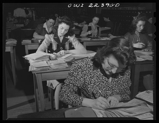 Philadelphia, Pennsylvania. Checking amounts of the order at the W. Atlee Burpee Company, seed dealers