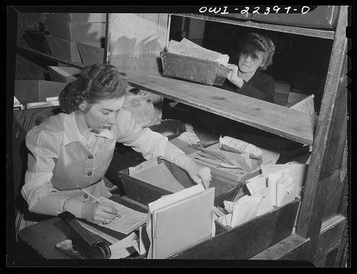 Philadelphia, Pennsylvania. Checking filled orders at the W. Atlee Burpee Company, seed dealers