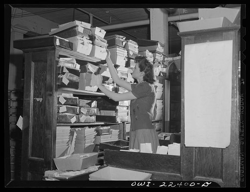 Philadelphia, Pennsylvania. Trays used to assemble seed package from racks at the W. Atlee Burpee Company, seed dealers