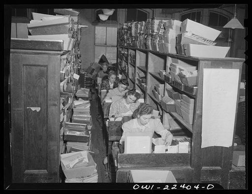 Philadelphia, Pennsylvania. Women checking filled orders at the W. Atlee Burpee Company, seed dealers