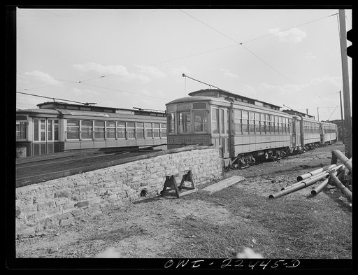 Baltimore, Maryland. These trolleys dating from about 1914 can be reconditioned for use if wartime needs so demand. In the yard of the Washington terminal, maintenance plant of the Baltimore Transit Company