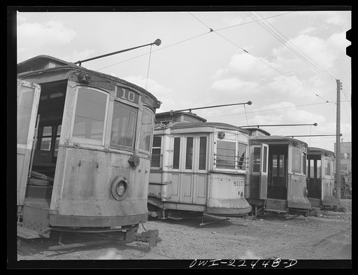 Baltimore, Maryland. Trolley junk in the yard at the Washington terminal, maintenance plant of the Baltimore Transit Company. Most of these trolleys were built before 1907 and are too old to recondition despite wartime needs