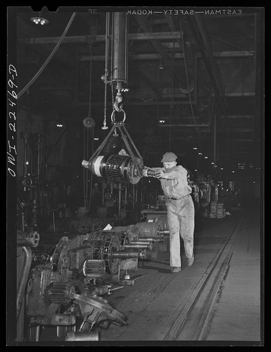 Baltimore, Maryland. Hauling armature of a trolley motor to be overhauled at the amature shop at the Washington terminal, maintenance plant of the Baltimore Transit Company
