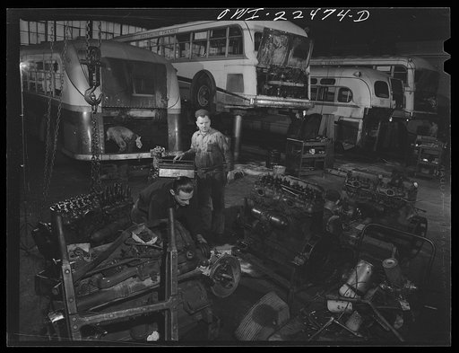Baltimore, Maryland. Repairing busses and their motors at the Washington terminal, maintenance plant of the Baltimore Transit Company