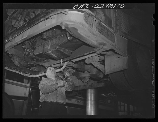 Baltimore, Maryland. Repairing a bus at the Washington terminal, maintenance plant of the Baltimore Transit Company