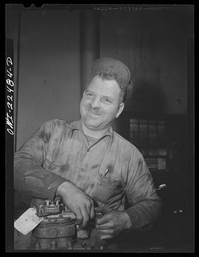 Baltimore, Maryland. Mechanic in the bus repair department of the Washington terminal, maintenance plant of the Baltimore Transit Company