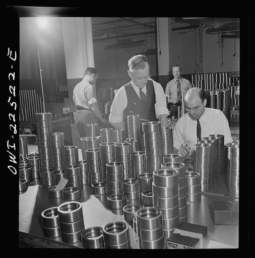 Untitled photo, possibly related to: Philadelphia, Pennsylvania. Swedish-American foreman (left) at the SKF roller bearing factory