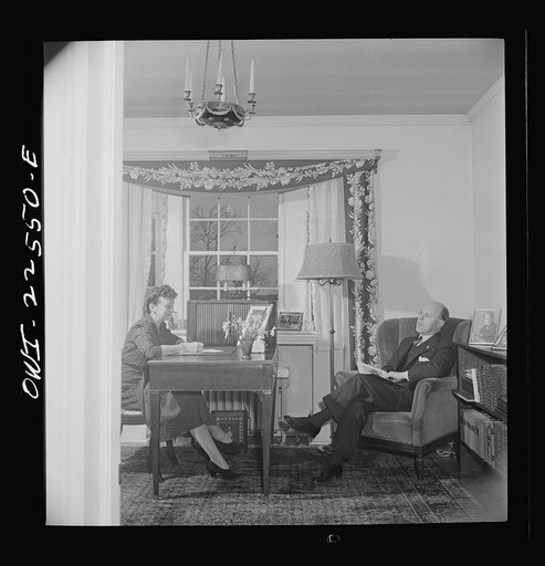 Untitled photo, possibly related to: Philadelphia, Pennsylvania. Swedish-American engineer at the SKF roller bearing factory with his wife at home