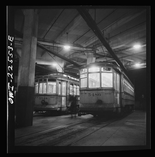 Untitled photo, possibly related to: Baltimore, Maryland. Trolleys inside the Park terminal at night