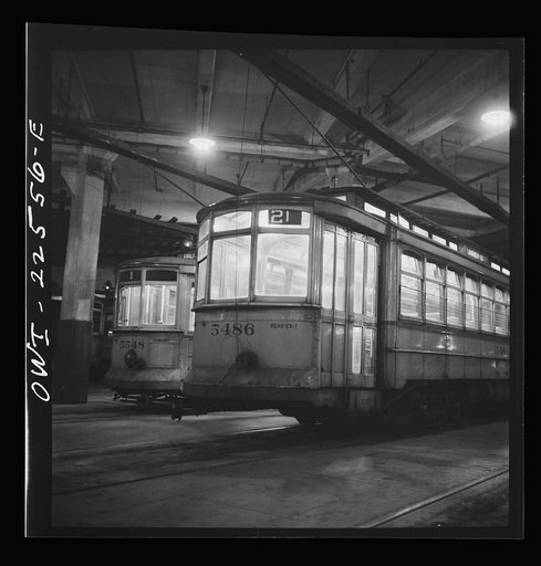 Untitled photo, possibly related to: Baltimore, Maryland. Trolleys inside the Park terminal at night