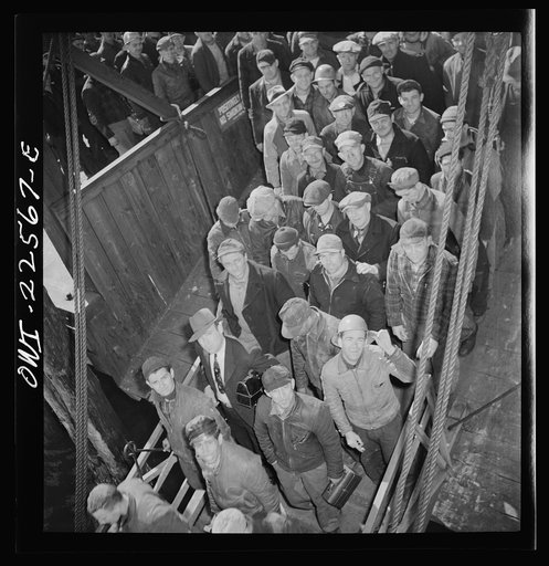 Baltimore, Maryland. Bethlehem Fairfield shipyard workers boarding a former Wilson Line pleasure boat, now used for workers' transportation, to get back to Baltimore from the second shift