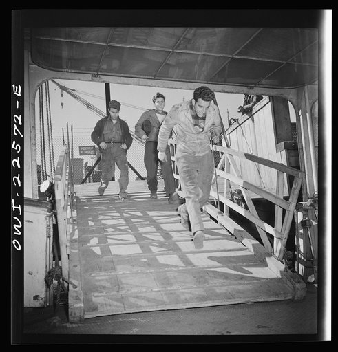 Baltimore, Maryland. Boarding a former Wilson Line boat, now used for transportation. Eighteen hundred men crowd onto the boat for the twenty minute trip across Curtis Bay to the Bethlehem Fairfield shipyard