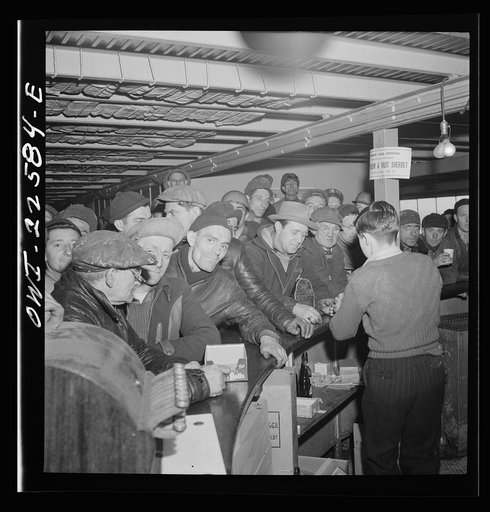 Baltimore, Maryland. Eighteen hundred workers are carried from the Bethlehem Fairfield shipyard to Baltimore on a former Wilson Line pleasure boat. The trip takes twenty minutes drinks
