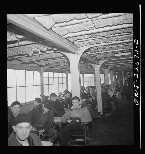 Untitled photo, possibly related to: Baltimore, Maryland. Eighteen hundred workers are carried from the Bethlehem Fairfield shipyard to Baltimore on a former Wilson Line pleasure boat. The trip takes twenty minutes