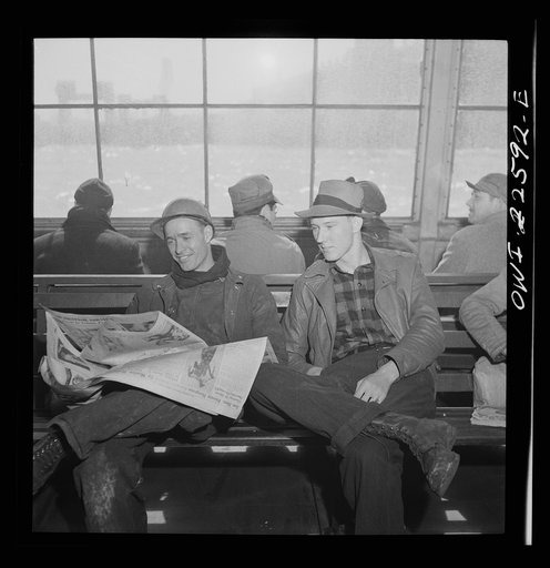 Baltimore, Maryland. Boarding a former Wilson Line boat, now used for workers' transportation. Eighteen hundred men crowd onto boat for the twenty minute trip across Curtis Bay to the Bethlehem Fairfield shipyard