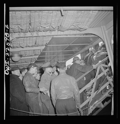 Untitled photo, possibly related to: Baltimore, Maryland. Boarding a former Wilson Line boat, now used for transportation. Eighteen hundred men crowd onto the boat for the twenty minute trip across Curtis Bay to the Bethlehem Fairfield shipyard