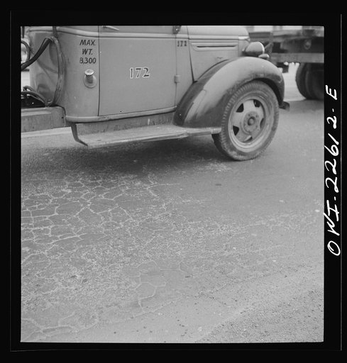 Baltimore, Maryland. Road from the Bethlehem Fairfield shipyard to Baltimore wears out constantly from the steady stream of traffic