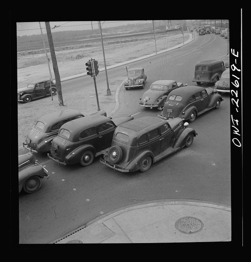 Baltimore, Maryland. Traffic jam on the road from the Bethlehem Fairfield shipyard to Baltimore as the second shift of workers leave the plant