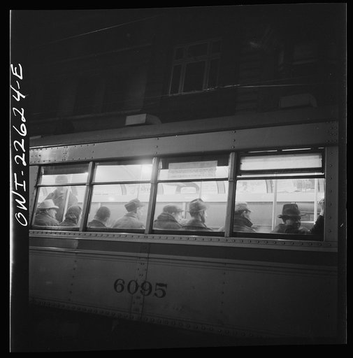 Untitled photo, possibly related to: Baltimore, Maryland. Trolley carrying workers to the night shift at the Bethlehem Fairfield shipyard