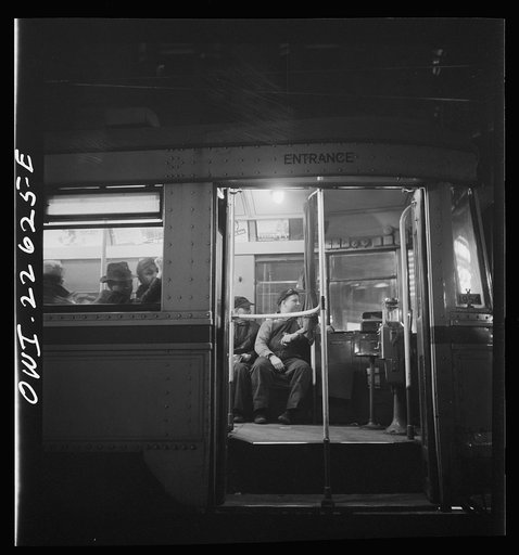 Untitled photo, possibly related to: Baltimore, Maryland. Trolley carrying workers to the night shift at the Bethlehem Fairfield shipyard