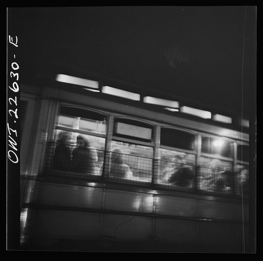 Untitled photo, possibly related to: Baltimore, Maryland. Trolley carrying workers to the night shift at the Bethlehem Fairfield shipyard