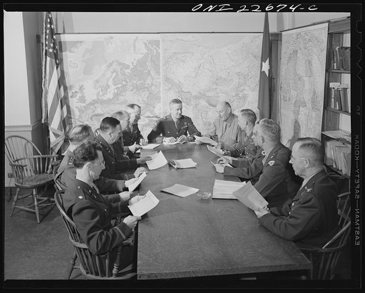 Charlottesville, Virginia. General Wickersham in conference with his staff in the School of Military Government at the University of Virginia
