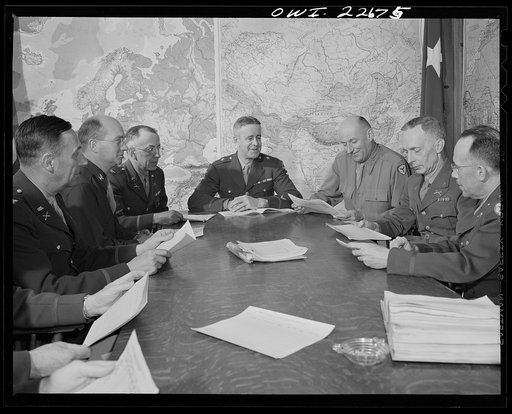 Charlottesville, Virginia. General Wickersham in conference with his staff in the School of Military Government at the University of Virginia