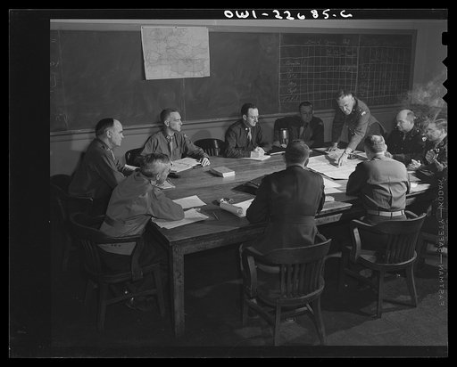 Untitled photo, possibly related to: Charlottesville, Virginia. Committee of ten solving a tactical problem of administrative government in the School of Military Government at the University of Virginia