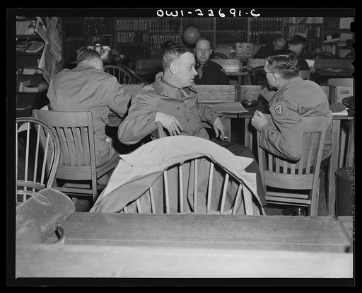 Untitled photo, possibly related to: Charlottesville, Virginia. Officers of the School of Military Government in the Library of International Law at the University of Virginia