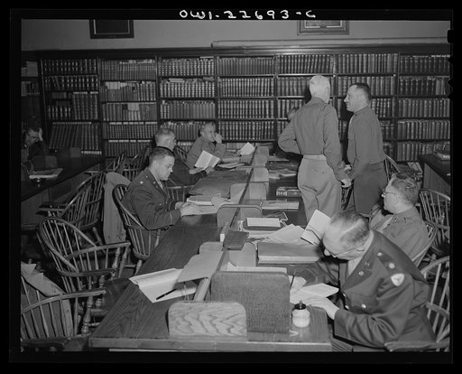 Untitled photo, possibly related to: Charlottesville, Virginia. Officers of the School of Military Government in the Library of International Law at the University of Virginia