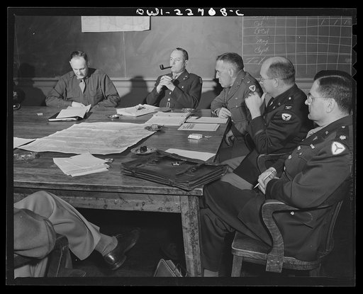 Charlottesville, Virginia. Officers assigned to the problem of foreign administrative policy in a committee meeting in the School of Military Government at the University of Virginia